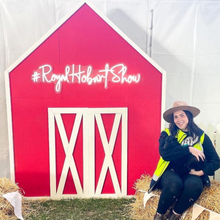 Custom Neon® sign for the Royal Hobart Show on a red and white barn @hobartshowgrounds