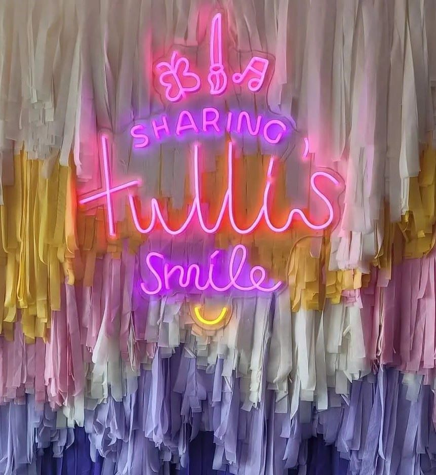 Custom Neon® colorful logo sign @sharingtullissmile