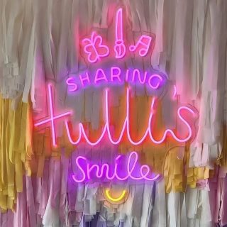 Custom Neon® colorful logo sign @sharingtullissmile