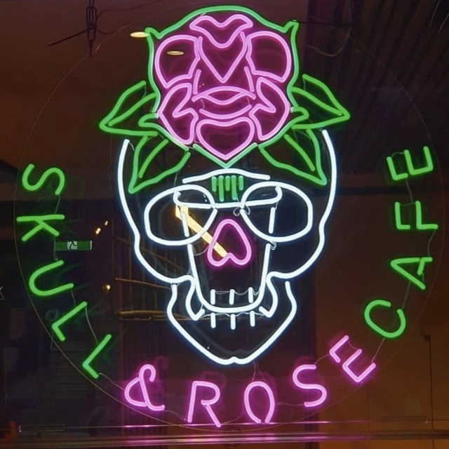 Multicoloured logo sign by Custom Neon® @skullandrosecafe