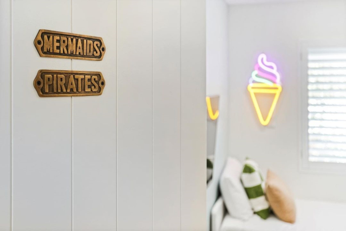 Custom Neon® soft serve ice cream cone on the wall in a kids room @noosaluxuryholidays @cosyhomesgroup
