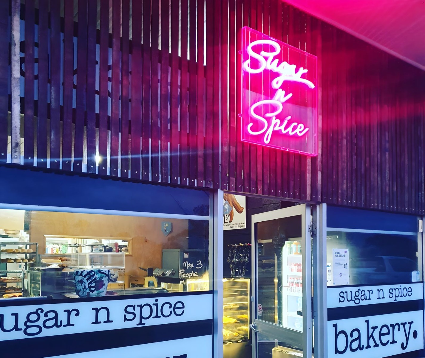 Custom Neon® shopfront bakery sign @bridportsugarnspicebakery