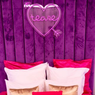 Tease Custom Neon® outdoor sign styled in the Love Island Australia garden