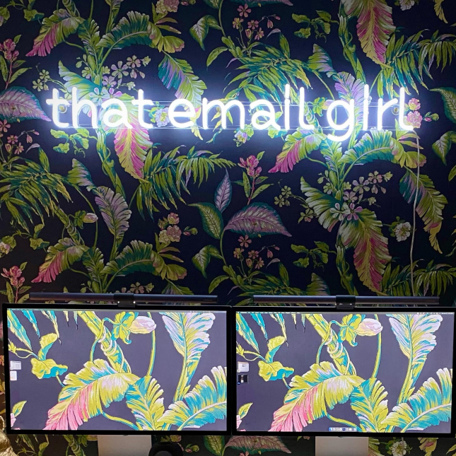 White Naked Neon™ home office sign on wallpapered wall by Custom Neon® @michellehollatz