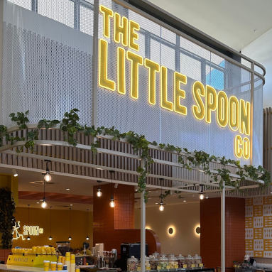 Large yellow coffee shop signage by Custom Neon® @thelittlespoonco