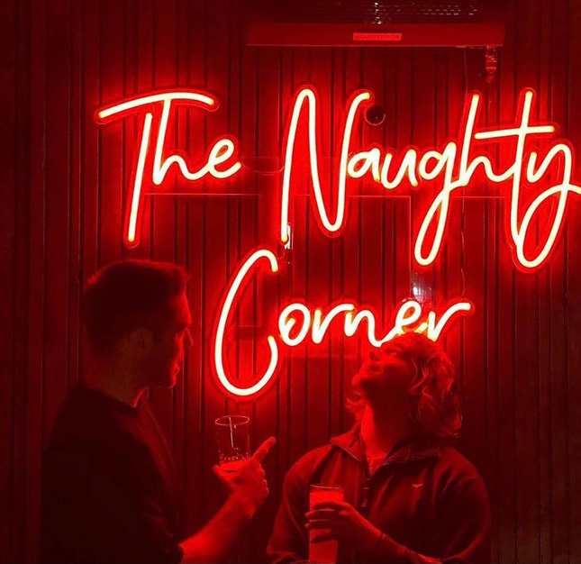The Naughty Corner photo wall sign made by Custom Neon® for @thearborfreo