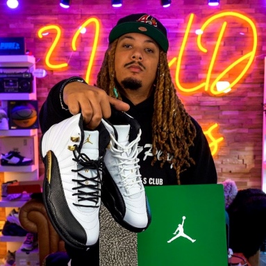 Large orange Custom Neon® YouTube backdrop sign @tonyd2wild2