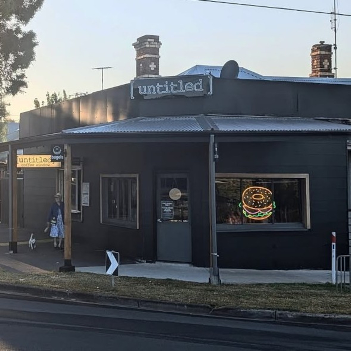 Custom Neon® outdoor bakery logo sign @untitledcafe_