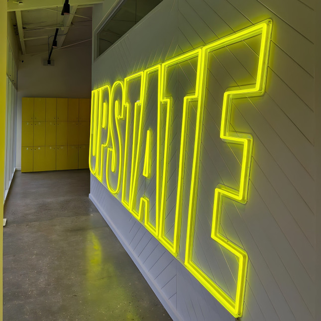 Custom Neon&reg; fitness studio branded signage @upstate_studios