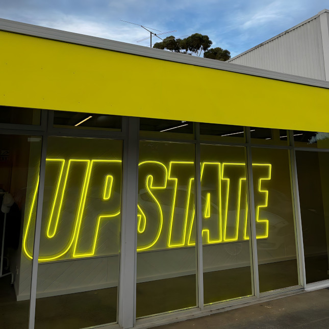 Custom Neon&reg; fitness studio branded signage @upstate_studios