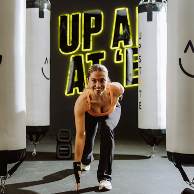 Custom Neon® blank and yellow backlit LED signage in the @upstate_studio
