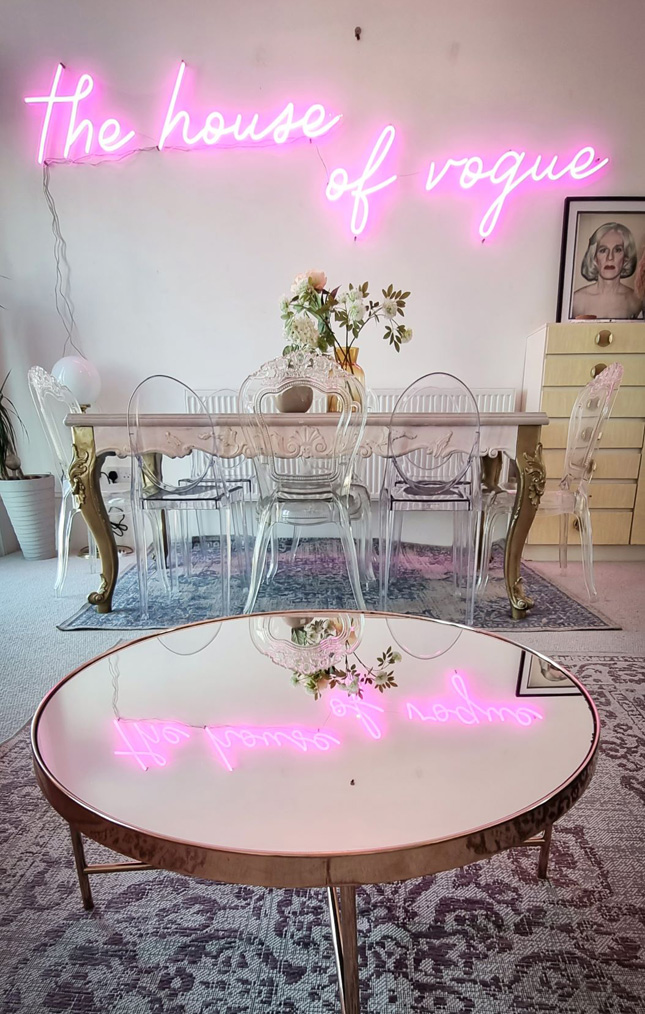 Pink Custom Neon® The House of Vogue sign in airbnb