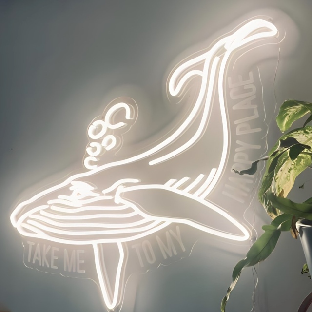 Custom Neon® white LED neon whale with UV printed text reading Take Me To My Happy Place