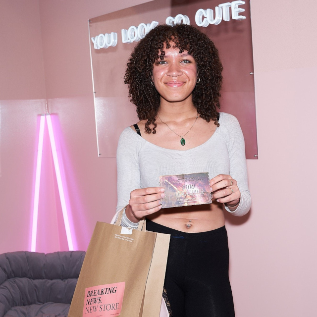 Custom Neon® white You Look So Cute sign on a mirror in the Supre store selfie nook @supre_instagram